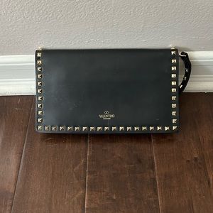 Valentino Garvani leather hand clutch with gold studs